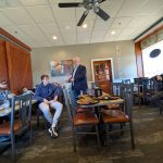 US Senate candidate Jim Carlin talking in front of a crowd at Sioux Center Pizza Ranch